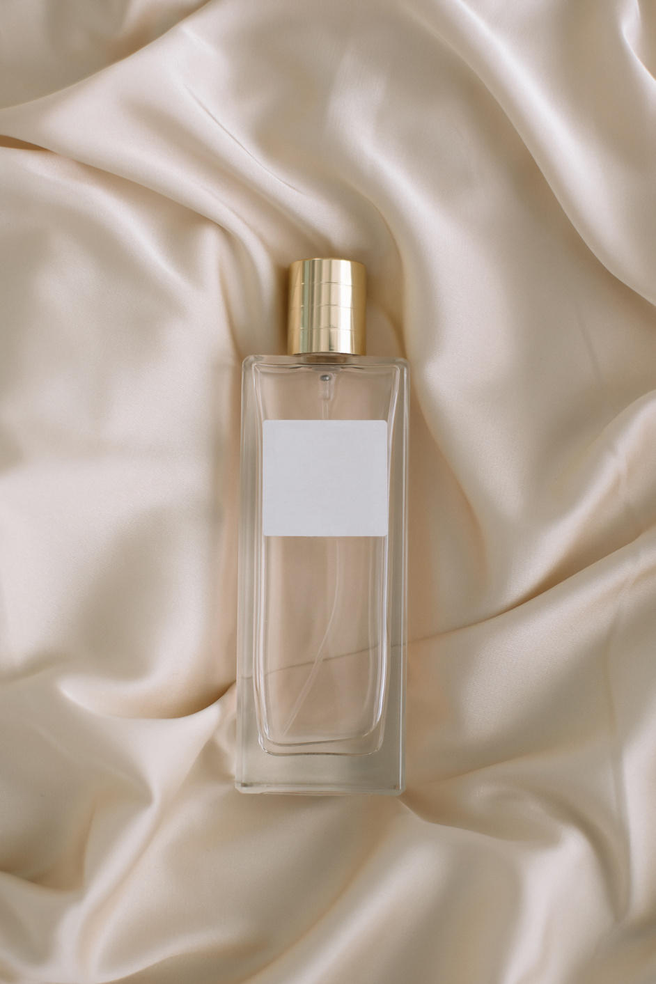 Bottle of Perfume on Satin